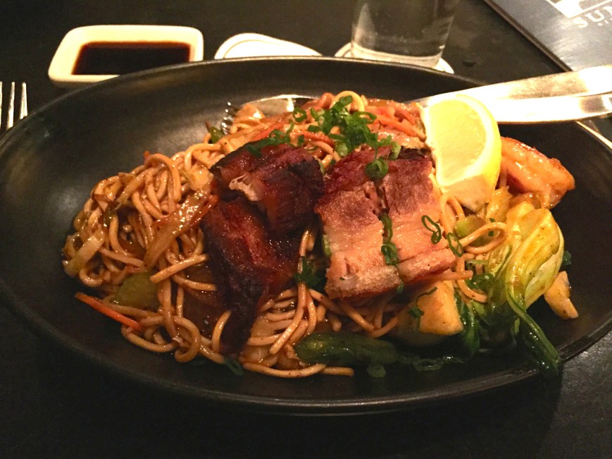 Pancit Canton - crispy pork belly, lap cheong, shrimp, egg noodles, carrots, cabbage, bok choy, scallions, lemon cantonese sauce