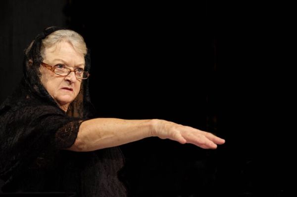 Kate Young as A Widow