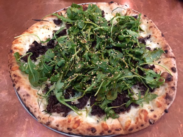 Korean BBQ Pizza - Grass Run Farm Beef Short Ribs, Mozzarella, Scallions, Arugula, Sesame & Soy-Chili Vinaigrette ($17)